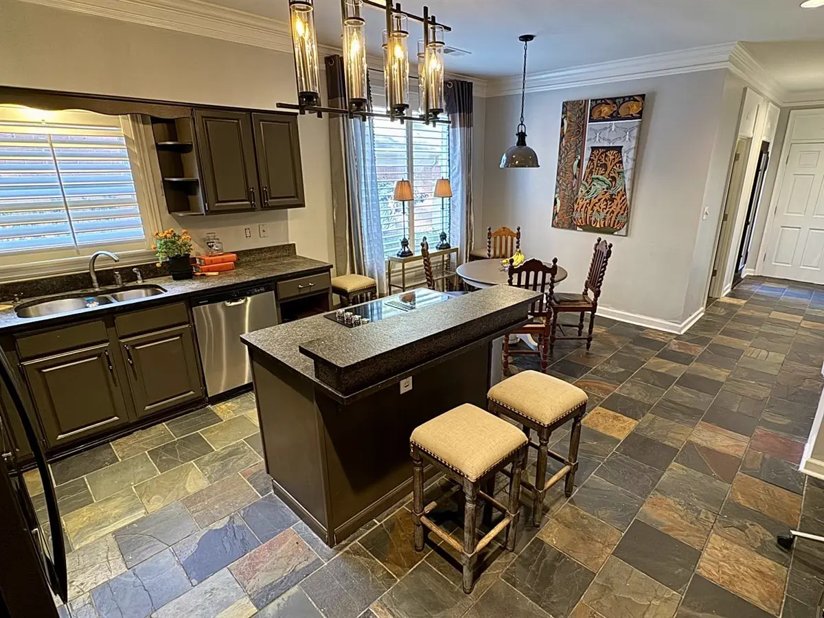 Southwind Kitchen After: SW Black Fox cabinets, Repose Gray walls, and hand-painted Art Nouveau botanical mural by Stevan Collins Lazich