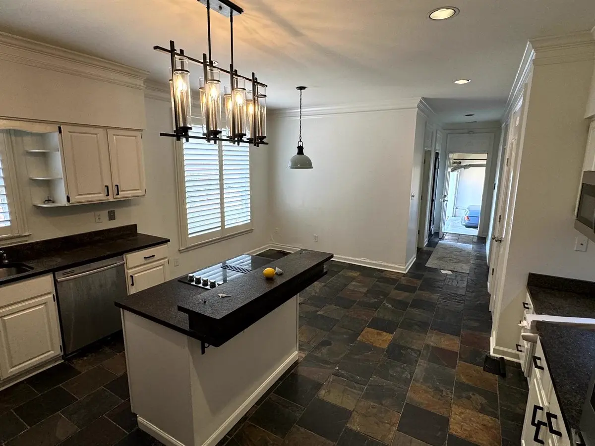 Southwind Kitchen Before: Builder-grade Alabaster White cabinets and bare walls