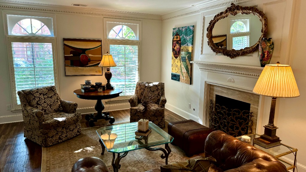 Southwind Fireplace Salon with Cut Velvet Coral Swivel Chairs, Gilded Eagle & Peacock Art